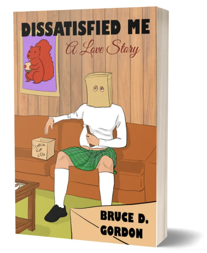 Book cover image: A white man in a kilt and long sleeved white shirt sits on a couch with a paper bag over his head. The room is a 70s basement. Eeek.